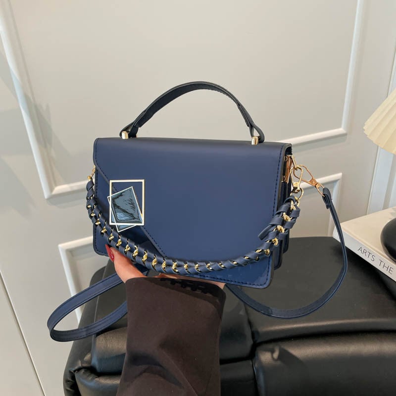 PU crossbody torbica u urbanom minimalističkom stilu, horizontalnog kvadratnog oblika, nylon podstava, unutarnji džep sa zatvaračem