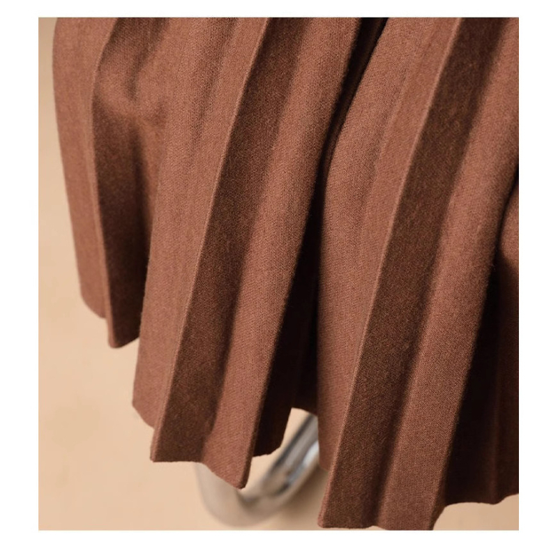 Fustă plisată în linie A, talie înaltă, lungime midi, plisă acordeon și drapaj