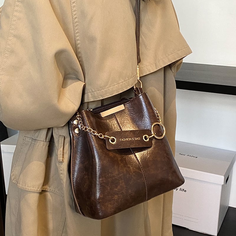 Ženska crossbody bucket torba (PU materijal, gradski minimalistički stil, magnetsko zatvaranje, džep sa zipom)