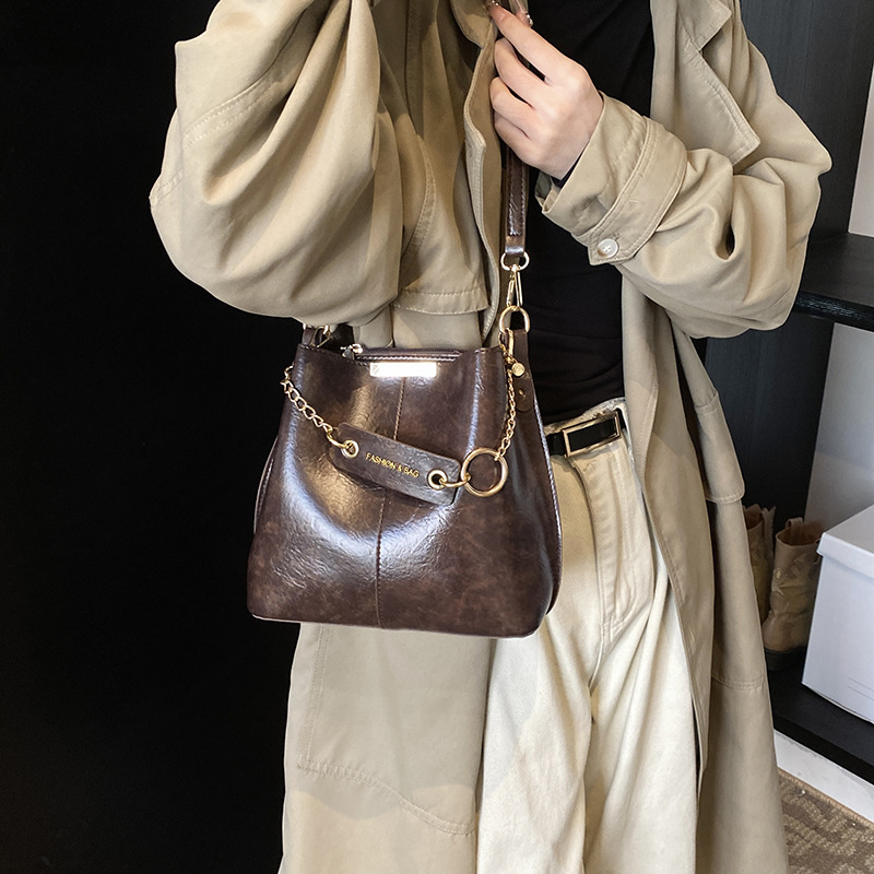 Ženska crossbody bucket torba (PU materijal, gradski minimalistički stil, magnetsko zatvaranje, džep sa zipom)
