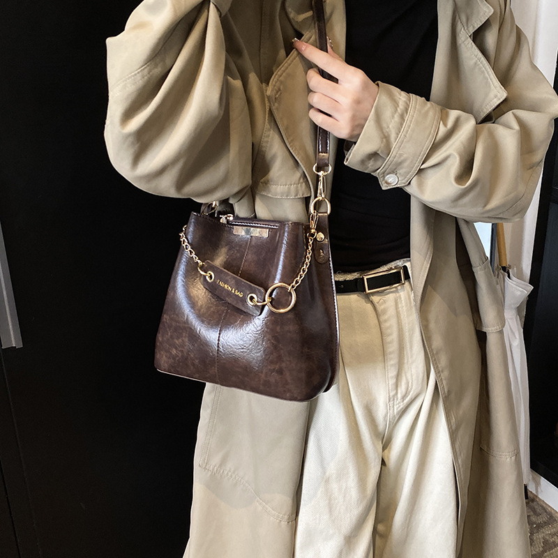 Ženska crossbody bucket torba (PU materijal, gradski minimalistički stil, magnetsko zatvaranje, džep sa zipom)