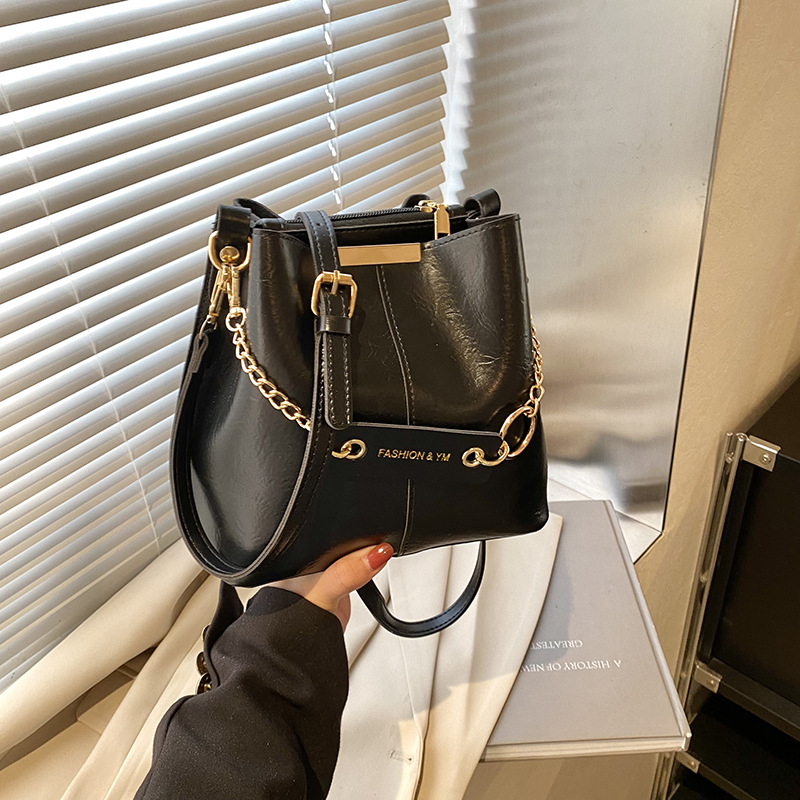 Ženska crossbody bucket torba (PU materijal, gradski minimalistički stil, magnetsko zatvaranje, džep sa zipom)