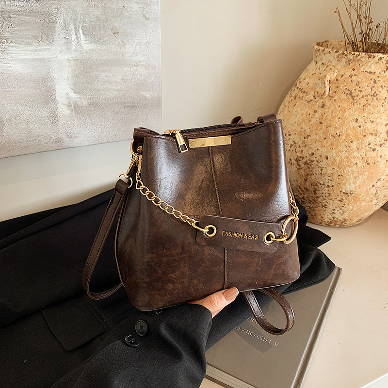 Ženska crossbody bucket torba (PU materijal, gradski minimalistički stil, magnetsko zatvaranje, džep sa zipom)