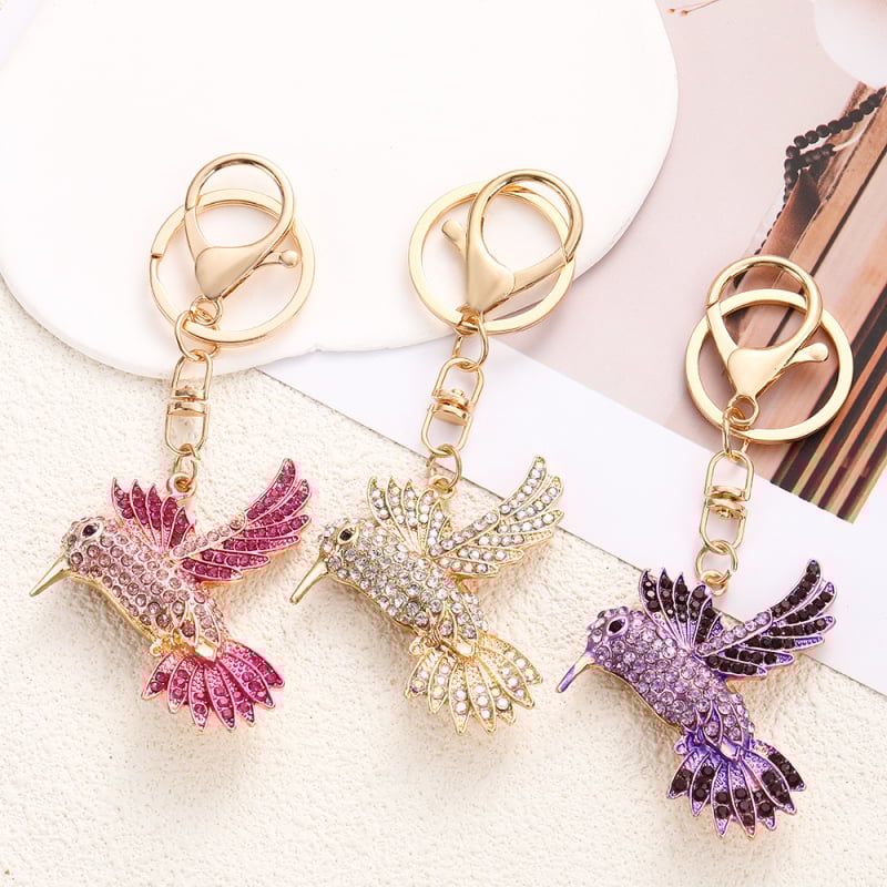 Kulcstartó – Béke galamb repülő dizájn, gyémánt beültetéssel, cink ötvözetből készült, ajándék táskákhoz és autókhoz