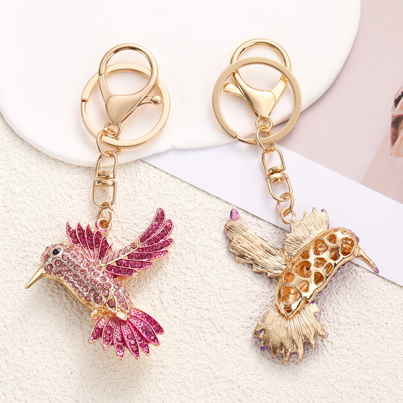 Kulcstartó – Béke galamb repülő dizájn, gyémánt beültetéssel, cink ötvözetből készült, ajándék táskákhoz és autókhoz