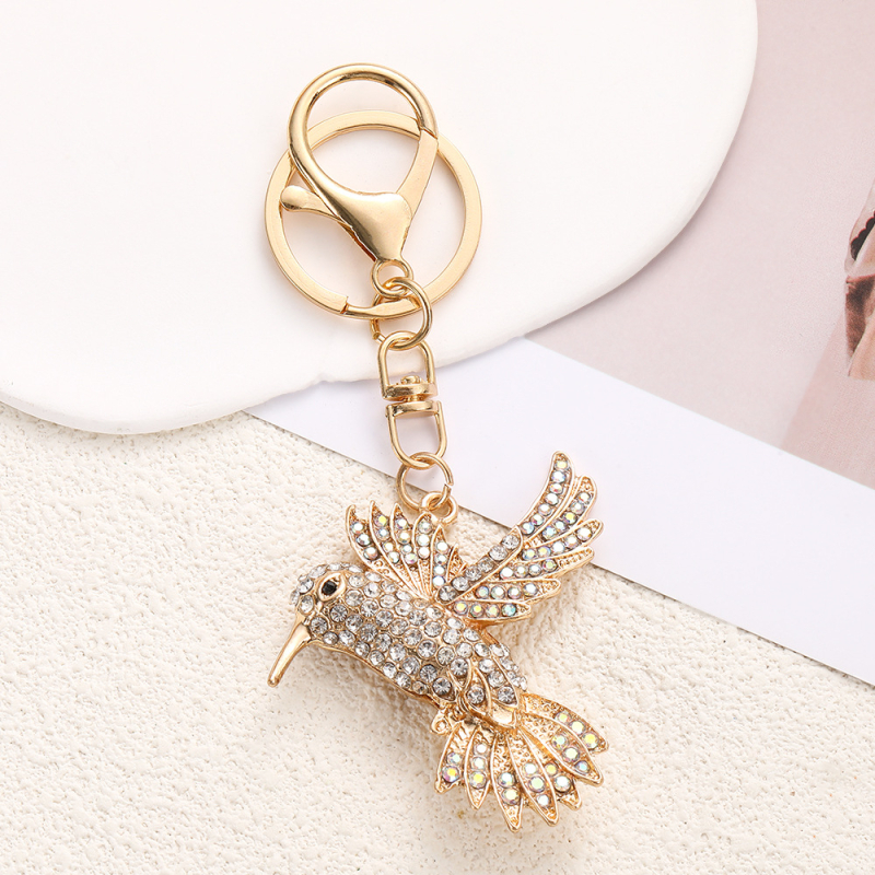 Kulcstartó – Béke galamb repülő dizájn, gyémánt beültetéssel, cink ötvözetből készült, ajándék táskákhoz és autókhoz