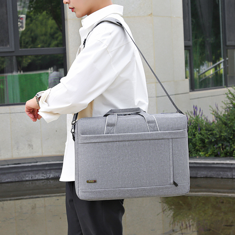 Nova torba za prijenosno računalo za žene, velika kapaciteta i multifunkcionalna crossbody torba s ojačanim odjeljkom. Iz Oxford tkanine, vodootporna, otporna na habanje i smanjuje teret.