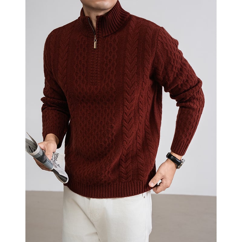 100% gyapjúból készült teljes testű kábeles kötésű pulóver jacquard mintával, cipzárral és fél magas gallérral, 7-gauge vastagság