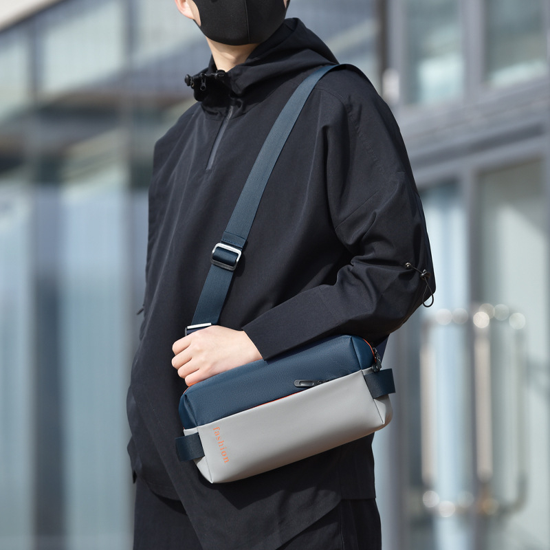 Muška prsna torba crossbody, poslovni stil, otporan materijal, poliester podstava, pogodna za poslovna putovanja