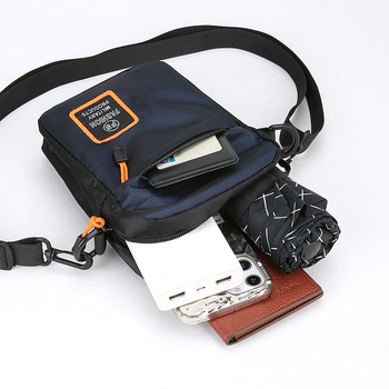 Férfi keresztpántos táska — városi egyszerűség; Anyag: Oxford szövet; Funkciók: ultrakönnyű, bővíthető; Mintázat: egyszínű; Belső: poliészter