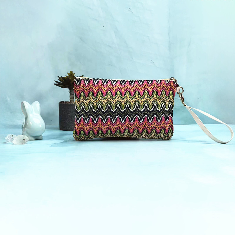 Damska clutch torbica od slame, horizontalni kvadratni oblik, zatvarač, poliester podstava, odvojiva ručka