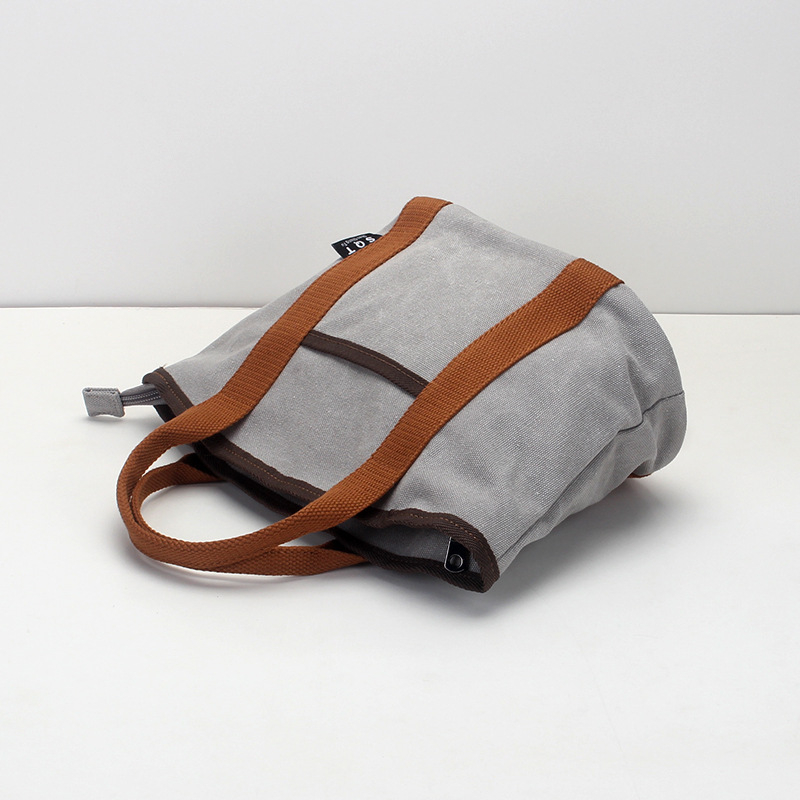 Kanvas bucket bag, casual stil, zatvarač, unutarnji džepovi (s džepom na zatvarač, džep za mobitel i ID), podstava od poliestera i pamuka