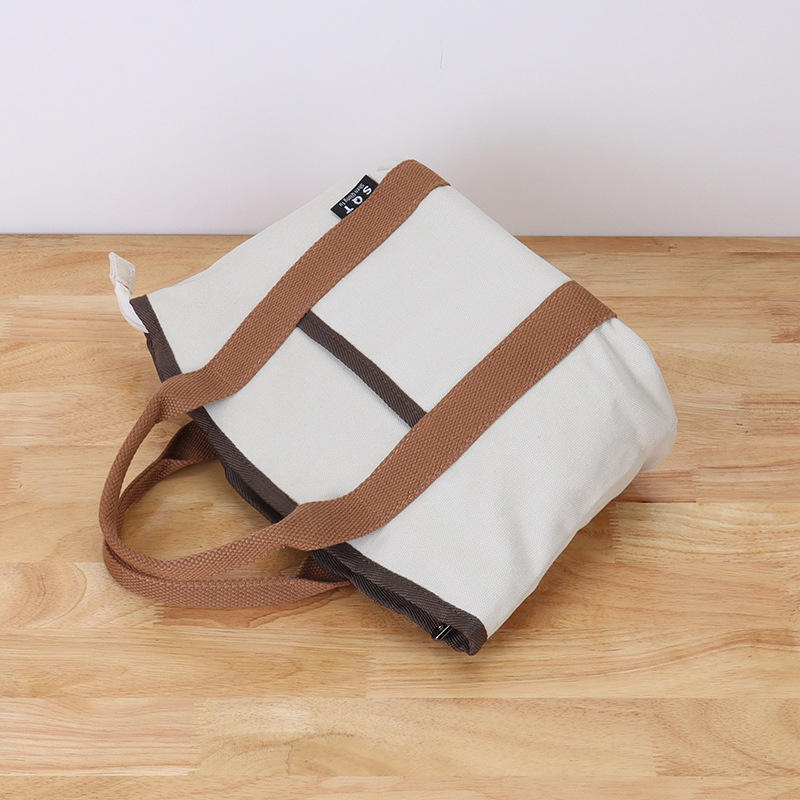 Kanvas bucket bag, casual stil, zatvarač, unutarnji džepovi (s džepom na zatvarač, džep za mobitel i ID), podstava od poliestera i pamuka