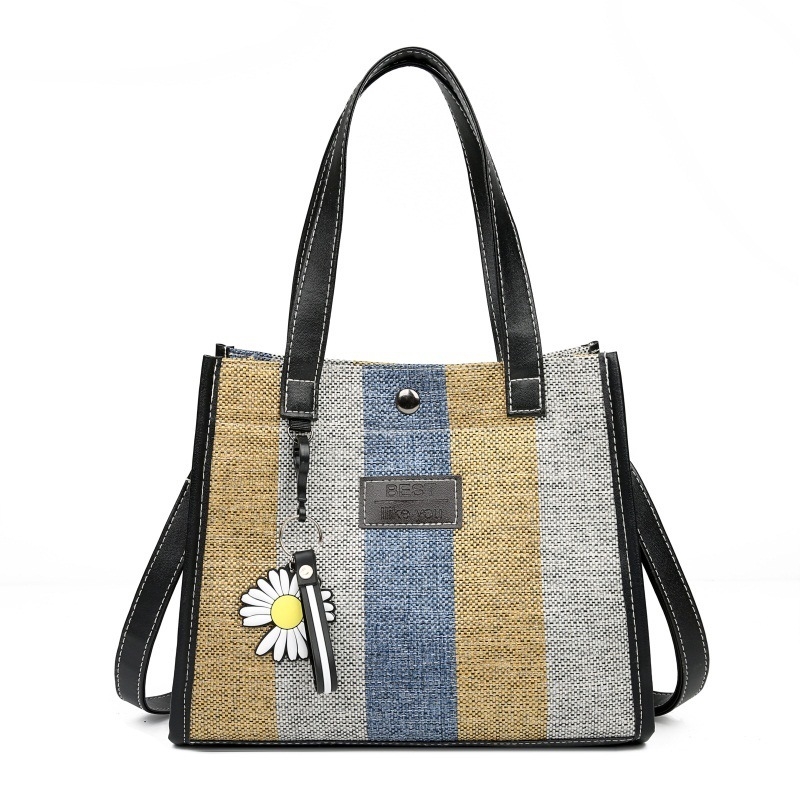 Ženska crossbody torbica — mali kvadratni oblik, PU materijal, magnetska kopča, vodoravni kvadrat, poliester podstava