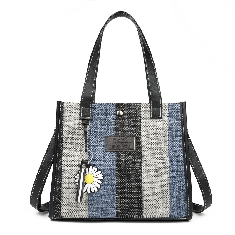 Ženska crossbody torbica — mali kvadratni oblik, PU materijal, magnetska kopča, vodoravni kvadrat, poliester podstava