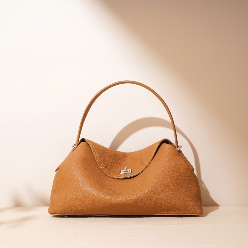 Torba preko ramena – crossbody, gradski minimalizam, koža prvog sloja goveda, oblik jastuka, zaključavanje, unutarnja kartica ID i džep sa zatvaračem