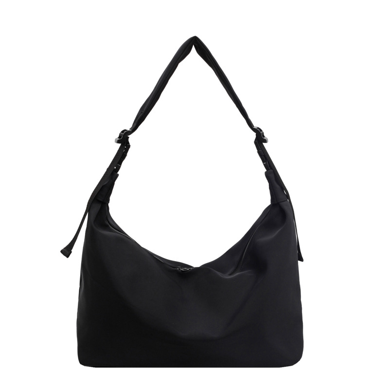 Crossbody torba od Oxford platna, oblik knedle, zatvarač, unutarnji džep sa zatvaračem i džep za telefon, gradski stil