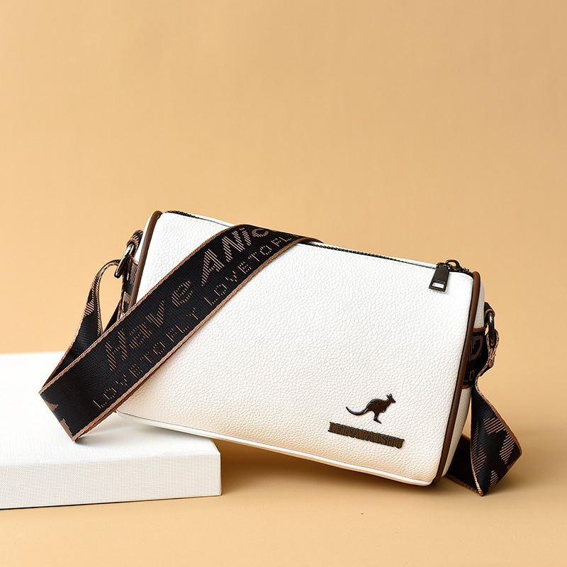 PU bőr crossbody táska, vízszintes négyzet alak, nagy kapacitás, cipzáras zárás.