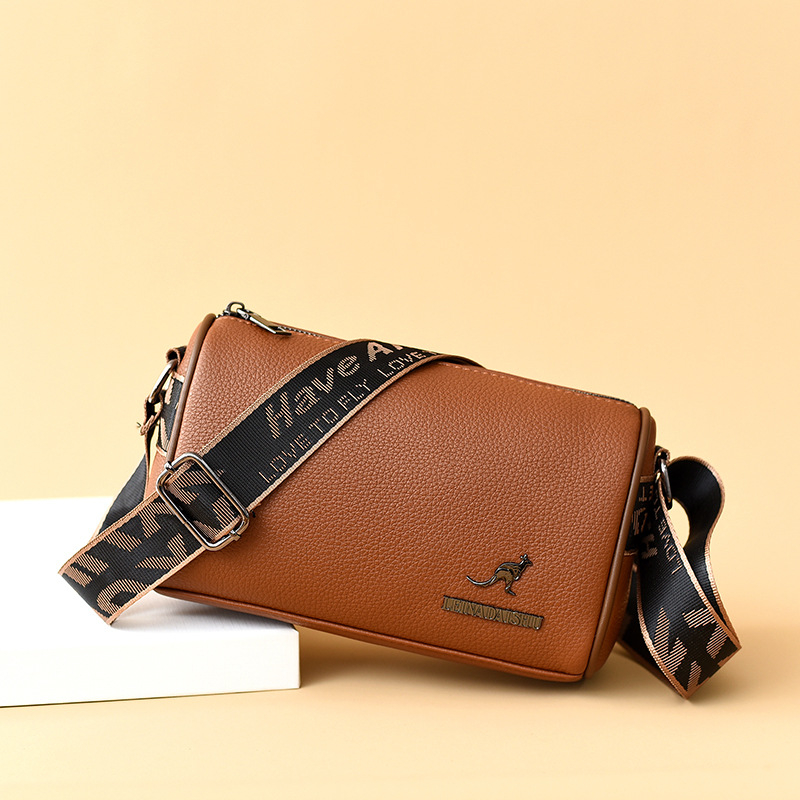 PU bőr crossbody táska, vízszintes négyzet alak, nagy kapacitás, cipzáras zárás.