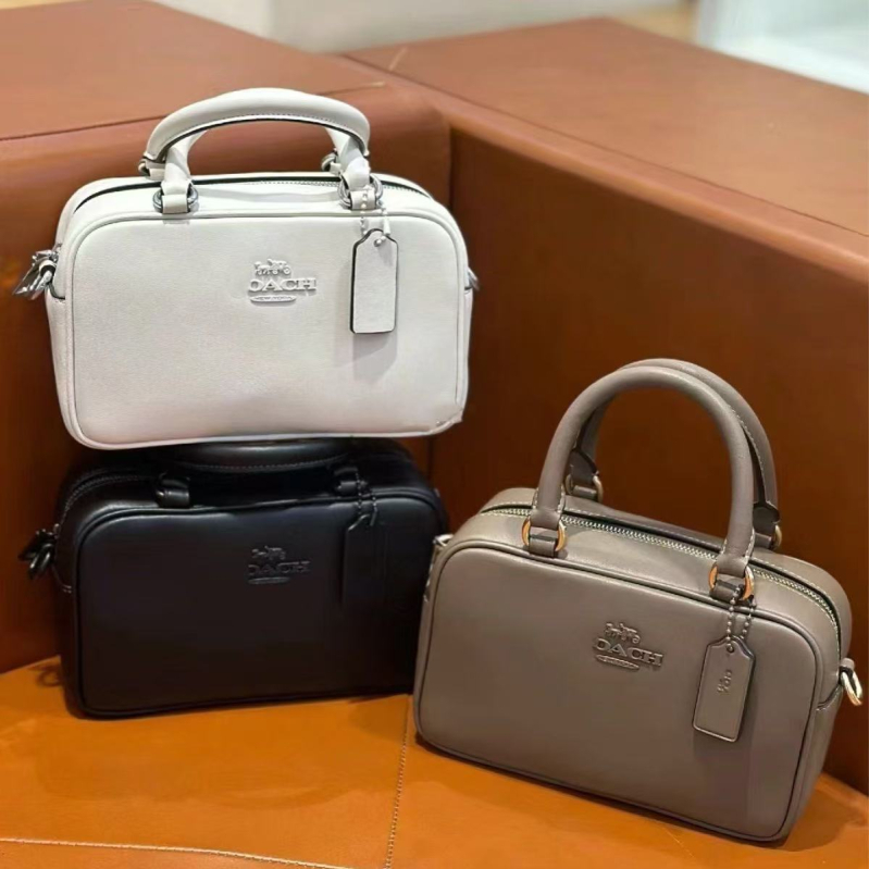 Satchel torba u urbanom minimalističkom stilu, od prave kože, horizontalni kvadratni oblik, zip zatvarač, poliester podstava