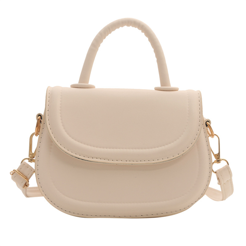 Crossbody torba (urbana jednostavnost) — PU materijal, mala kvadratna torba stil, ovalni oblik, otvaranje poklopcem, džep za prijenosno računalo