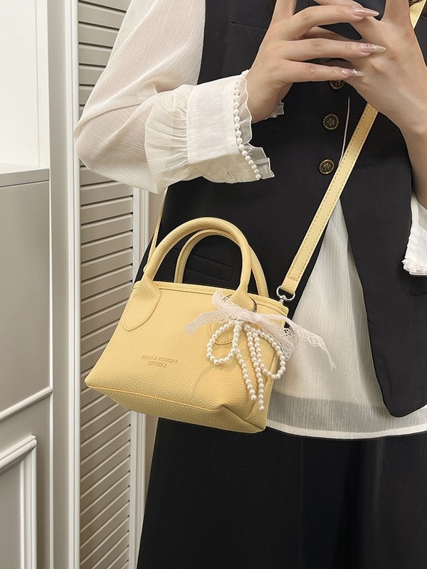 Ženska crossbody bucket torba (PU materijal, street-trend stil, zatvaranje na zip, podstava od poliester, džep za mobitel)