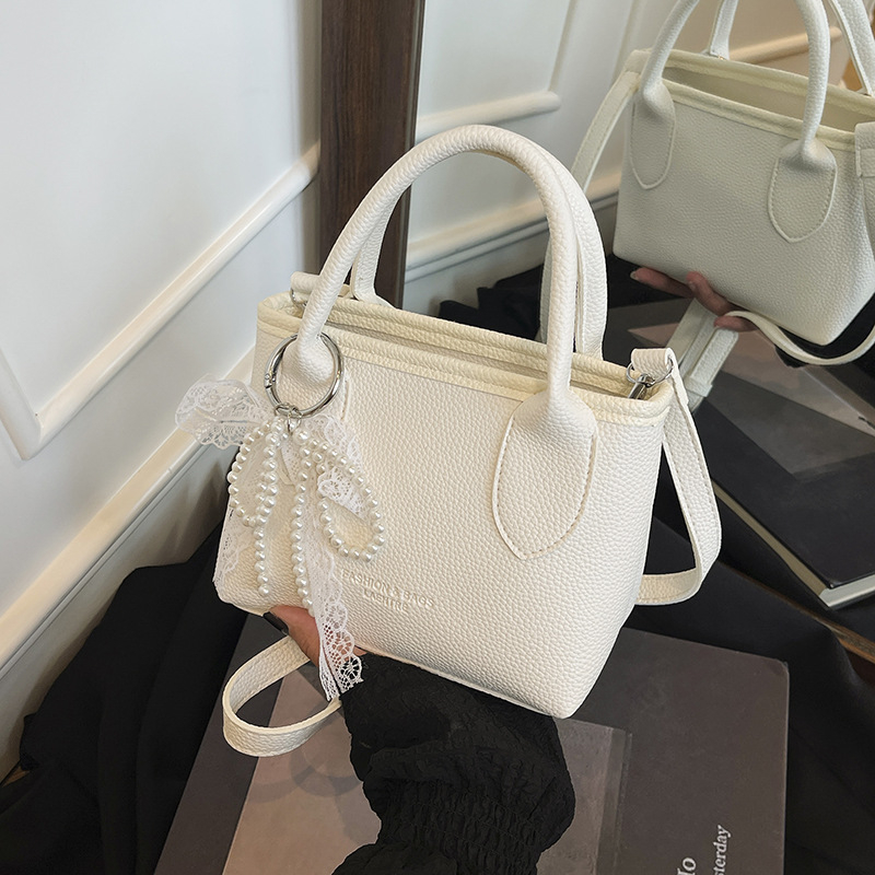 Ženska crossbody bucket torba (PU materijal, street-trend stil, zatvaranje na zip, podstava od poliester, džep za mobitel)