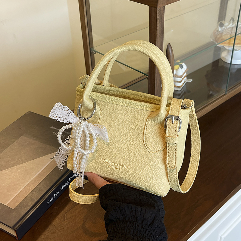 Ženska crossbody bucket torba (PU materijal, street-trend stil, zatvaranje na zip, podstava od poliester, džep za mobitel)