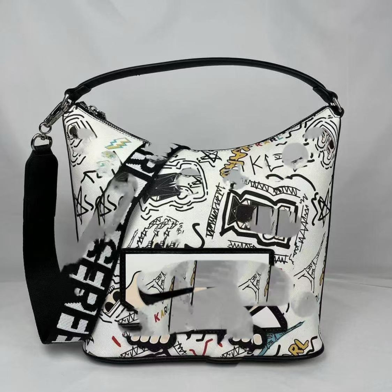Crossbody bucket torba od PU kože, zatvaranje na zip, podstava od sintetičke kože, stil za slobodno putovanje
