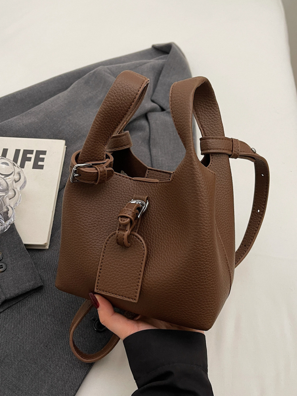 PU crossbody bucket bag, magnetsko zatvaranje, poliester podstava, jednoručna naramenica — jesen 2025 izdanje