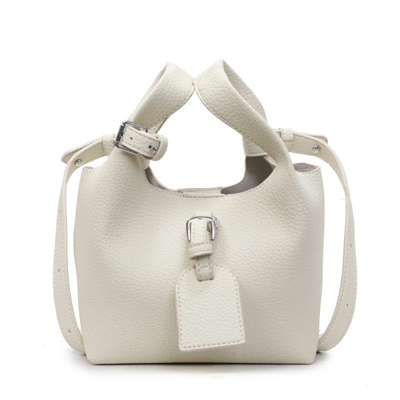 PU crossbody bucket bag, magnetsko zatvaranje, poliester podstava, jednoručna naramenica — jesen 2025 izdanje