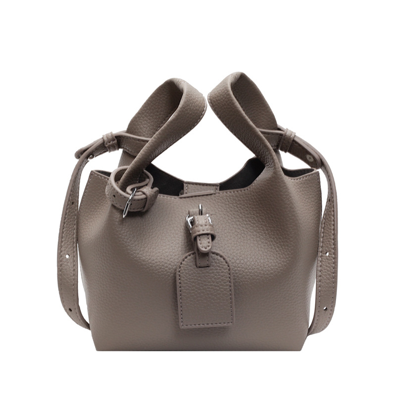 PU crossbody bucket bag, magnetsko zatvaranje, poliester podstava, jednoručna naramenica — jesen 2025 izdanje