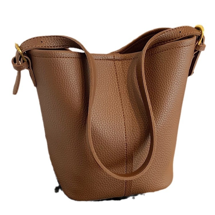 Bucket crossbody torba, PU koža, bucket oblik, magnetsko zatvaranje, unutarnji džep sa zipom