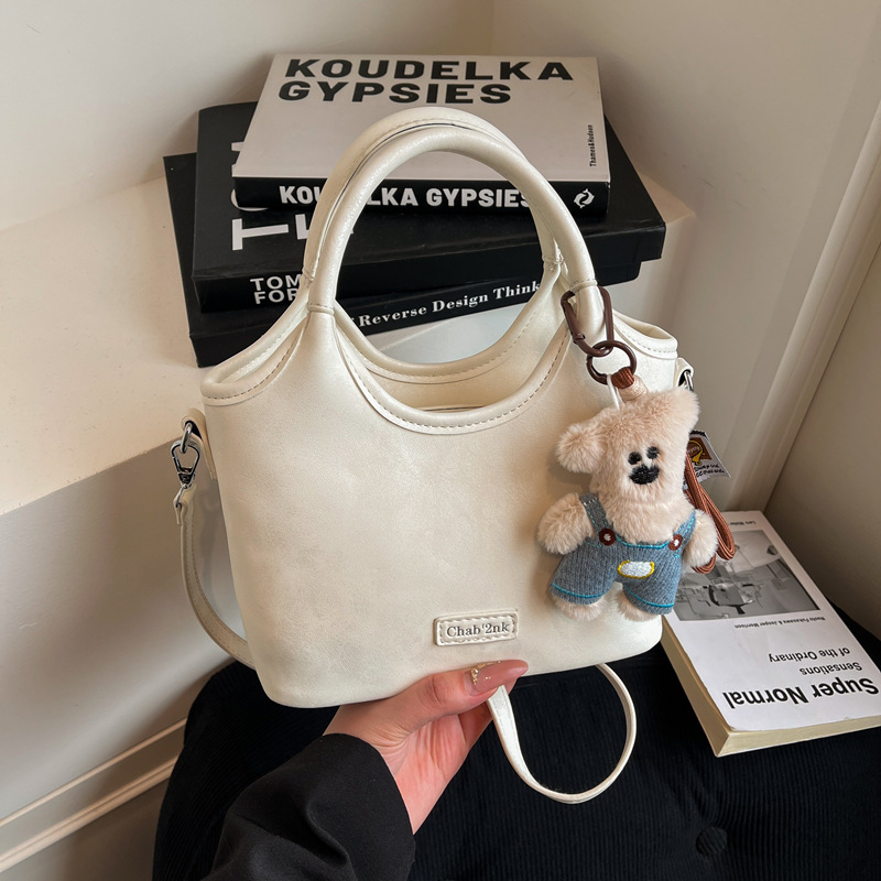 Geantă bucket urban minimalist din Super Fiber, închidere magnetică, buzunar interior cu fermoar