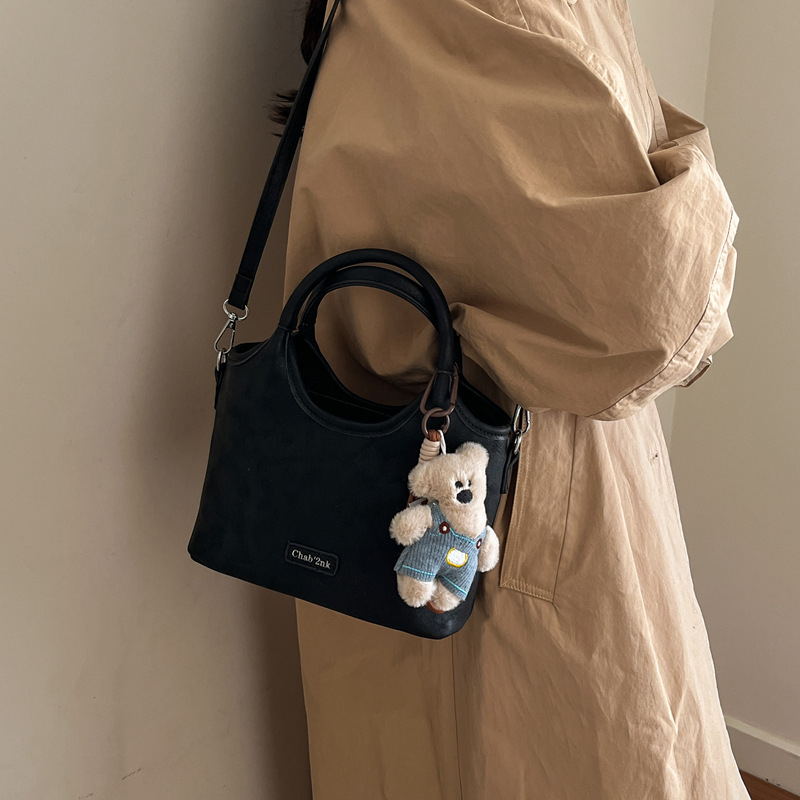 Geantă bucket urban minimalist din Super Fiber, închidere magnetică, buzunar interior cu fermoar