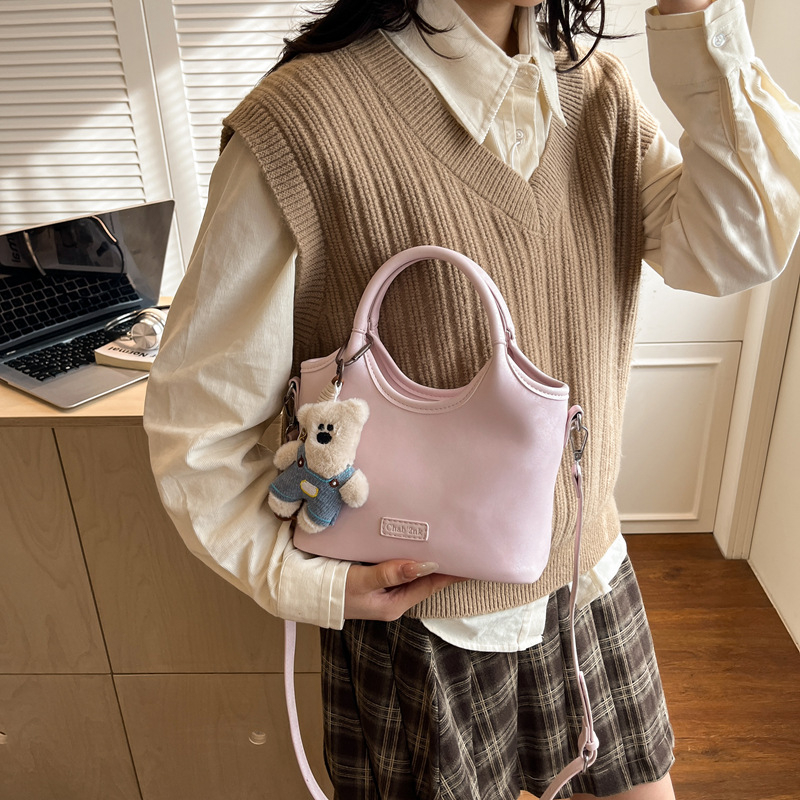 Geantă bucket urban minimalist din Super Fiber, închidere magnetică, buzunar interior cu fermoar