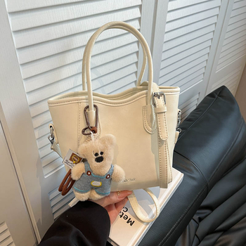 Geantă bucket din PU, stil urban minimalist, închidere magnetică, curea simplă, buzunar pentru telefon, primăvara 2026