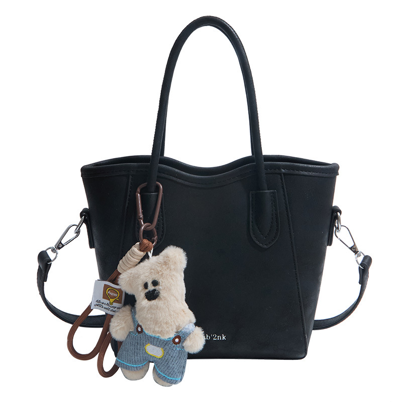 Geantă bucket din PU, stil urban minimalist, închidere magnetică, curea simplă, buzunar pentru telefon, primăvara 2026