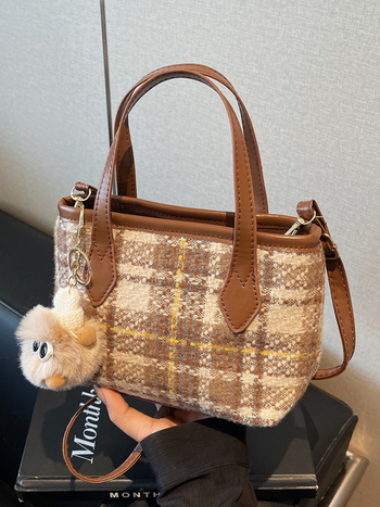 Ženska bucket bag – PU materijal, zatvarač, poliester podstava, horizontalni četverokutni oblik, džep za kameru