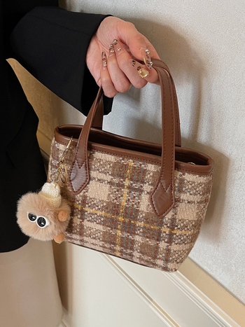 Ženska bucket bag – PU materijal, zatvarač, poliester podstava, horizontalni četverokutni oblik, džep za kameru