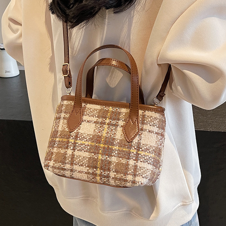 Ženska bucket bag – PU materijal, zatvarač, poliester podstava, horizontalni četverokutni oblik, džep za kameru