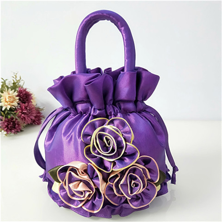 Ženska bucket bag od svile – ručna izrada, bucket stil, unutarnja pretinica, zatvaranje trakom