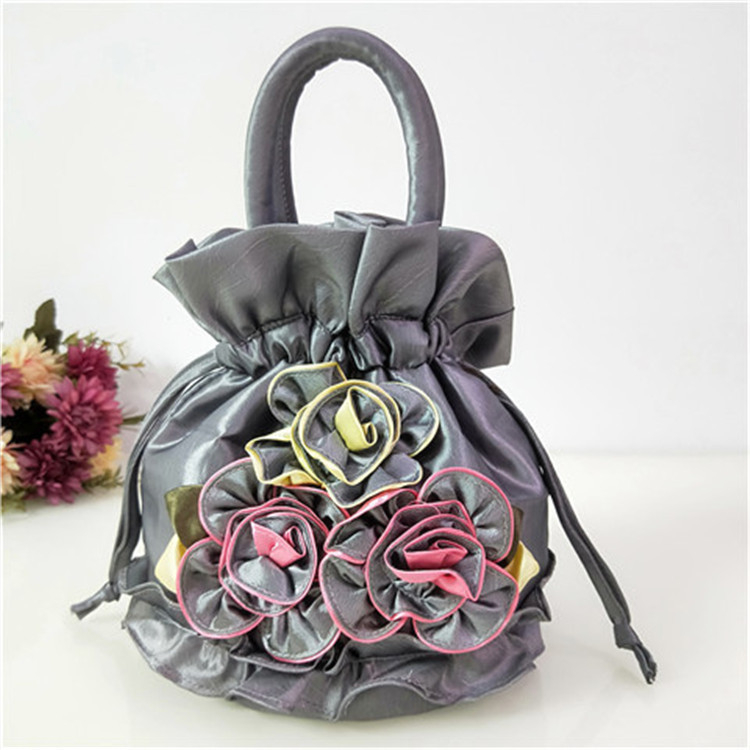 Ženska bucket bag od svile – ručna izrada, bucket stil, unutarnja pretinica, zatvaranje trakom