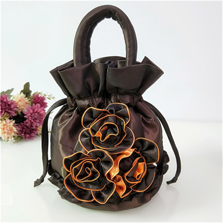 Ženska bucket bag od svile – ručna izrada, bucket stil, unutarnja pretinica, zatvaranje trakom