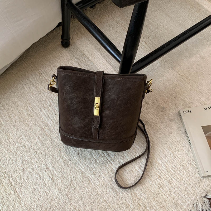 Gradskim minimalističkim PU crossbody bucket torba za žene — zatvarač, skriveni džep, podstava od poliestera, pravokutnog oblika, proljeće 2026