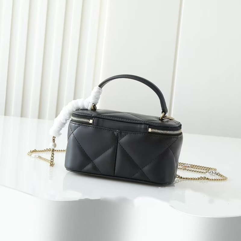 Crossbody torba s lancem, cilindrični oblik kutije, prirodna koža, zatvaranje zipom, unutarnja džep za telefon — street fashion