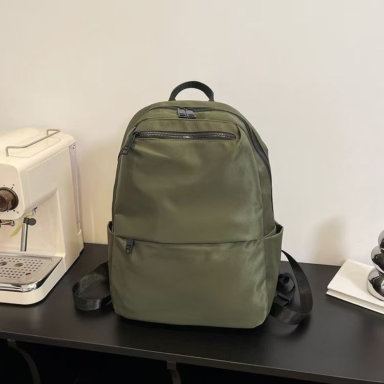 Ženski ruksak za outdoor aktivnosti – vodootporan najlon, velik kapacitet, zatvaranje na zip, prozračan