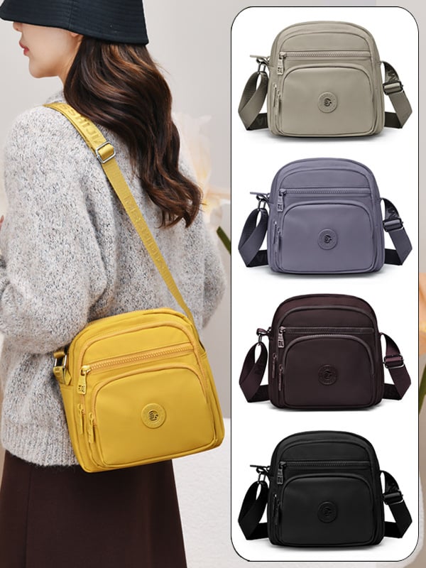 Damska crossbody torba od Oxford platna, vertikalno kvadratnog oblika, zatvarač, unutarnji pretinci: pretinac sa zatvaračem, pretinac za telefon, pretinac za dokumente, podstava od pamuka