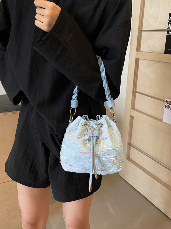 Ženska bucket bag torba, Oxford platno, zatvaranje šnira, džep za mobitel, podstava od poliestera, ljeto 2024