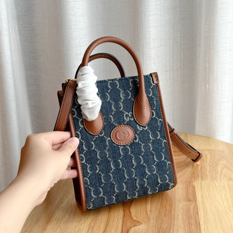 G-brand kožna retro tote torba za partituru – monogram uzorak (Materijal: prava koža; Podstava: platno; Oblik: uspravni kvadrat; Remenje: dvostruka; ID pretinac)